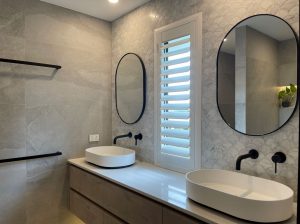 Bathroom Shutters Gold Coast. White framed and hinged