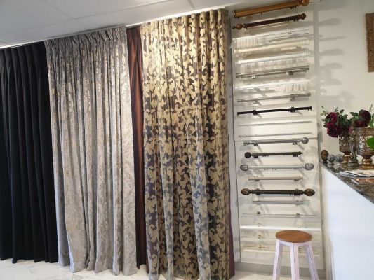 curtains and blinds on display in shop